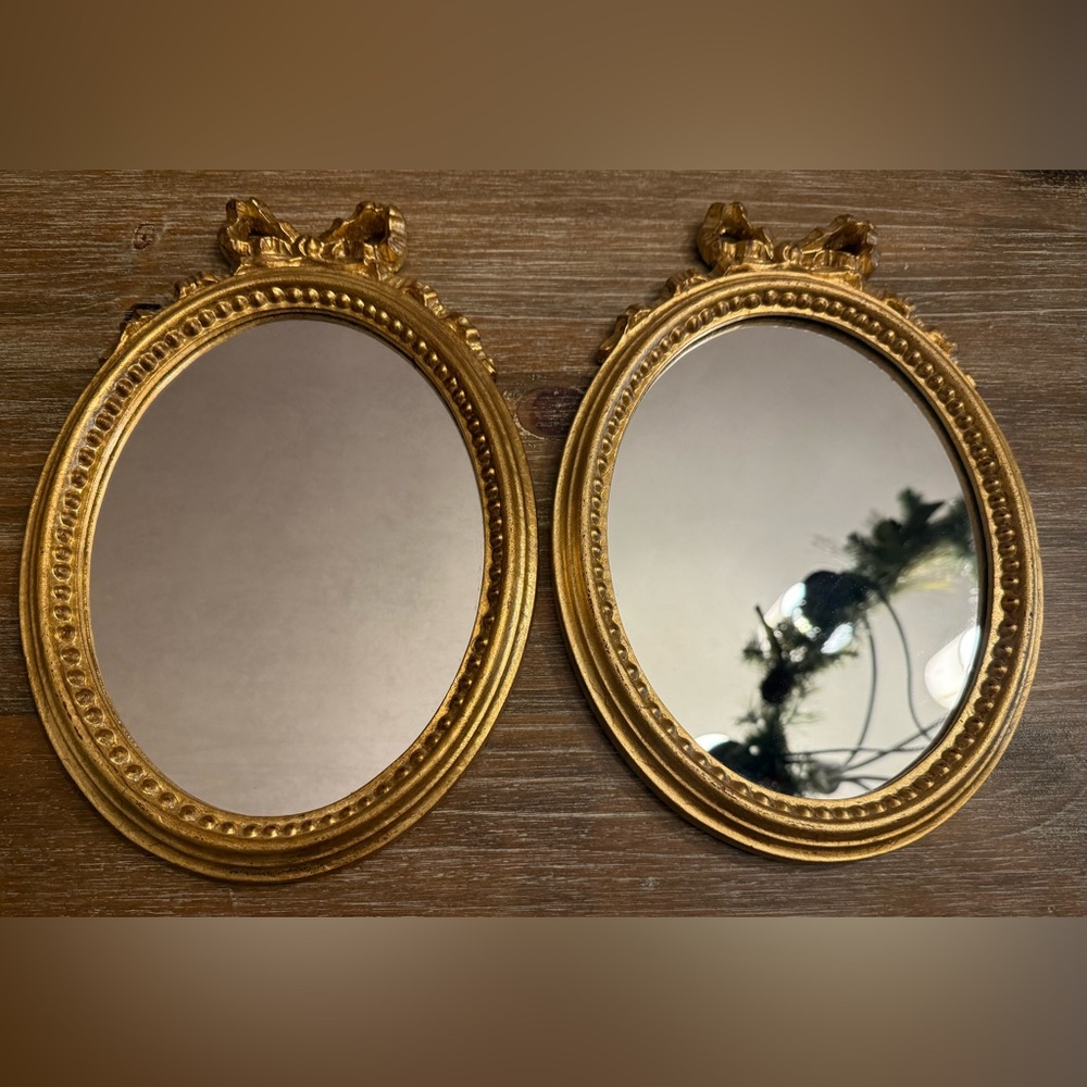 PAIR OF VINTAGE ITALIAN GILT OVAL MIRRORS, DECORATIVE KRAFTS INC.